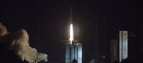 In this photo provided by China's official Xinhua News Agency, a Long March-4C rocket carrying a relay satellite, named Queqiao (Magpie Bridge), is launched from southwest China's Xichang Satellite Launch Center, Monday, May 21, 2018. China has launched a relay satellite as part of a groundbreaking program to land a probe on the far side of the moon this year. The China National Space Administration said on its website that the satellite lofted into space early Monday aboard a Long March-4C rocket will facilitate communication between controllers on Earth and the Chang'e 4 mission. - Sputnik International