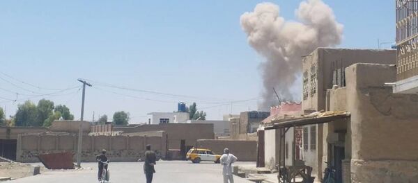 A cloud of smoke is seen after an explosion in Kandahar, Afghanistan May 22, 2018 in this picture obtained from social media A cloud of smoke is seen after an explosion in Kandahar, Afghanistan May 22, 2018 in this picture obtained from social media - Sputnik International