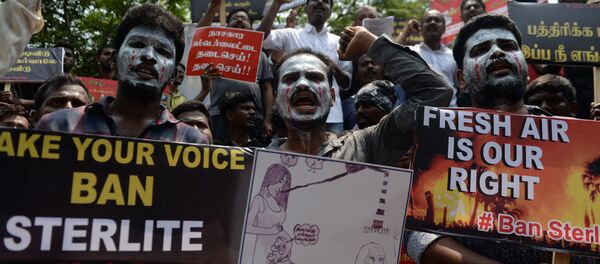 Indian residents along with their children hold placards and shout slogan demanding to shutdown a copper smelter company 'Sterlite' at Thoothukudi in Chennai on April 1, 2018 Indian residents along with their children hold placards and shout slogan demanding to shutdown a copper smelter company 'Sterlite' at Thoothukudi in Chennai on April 1, 2018 - Sputnik International