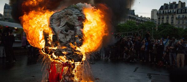 Rallies in Paris on the national protest day by French civil servants against French President Emmanuel Macron's economic reforms - Sputnik International