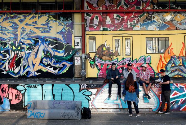 Artwork of urban artists is pictured at a former cigarette factory as part of the first Berlin Mural Fest 2018 - Sputnik International
