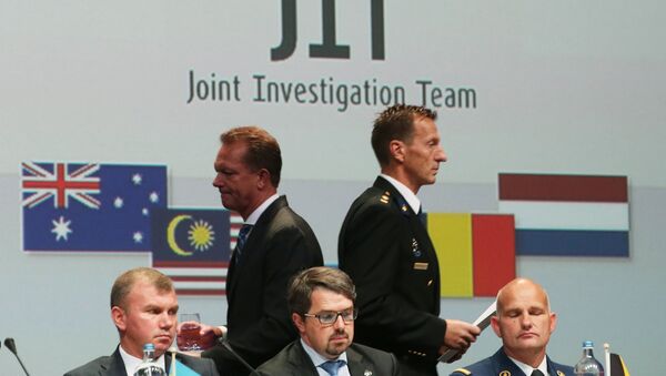Members of a joint investigation team present the preliminary results of the criminal investigation into the downing of Malaysia Airlines flight MH17 , in Nieuwegein, on September 28, 2016 - Sputnik International