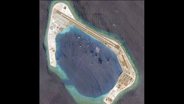 Satellite photo dated March 20, 2018 shows Subi Reef. - Sputnik International
