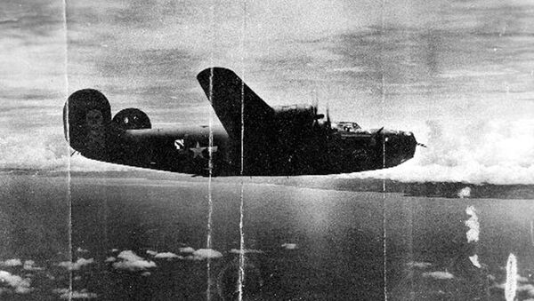 This circa 1943 U.S. Army Air Force photo from the Kelly Family Research Project shows the Heaven Can Wait B-24 bomber, location unknown, in which Lt. Thomas Kelly died when it was shot down in Hansa Bay in what is now Papua New Guinea during World War II. - Sputnik International