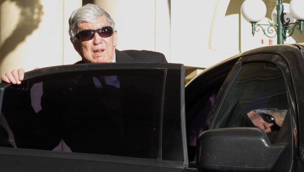 In this April 7, 2011 photo, Luis Posada Carriles gets into a car in front of the Camino Real hotel in downtown EL Paso, Texas - Sputnik International