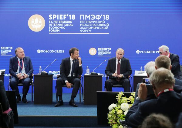 President of Russia Vladimir Putin and President of France Emmanuel Macron, second, left, during Russia-France Business Dialogue held as part of the St. Petersburg International Economic Forum. Left: President of the Movement of the Enterprises of France (MEDEF) Pierre Gattaz. President of Russia Vladimir Putin and President of France Emmanuel Macron, second, left, during Russia-France Business Dialogue held as part of the St. Petersburg International Economic Forum. Left: President of the Movement of the Enterprises of France (MEDEF) Pierre Gattaz. - Sputnik International