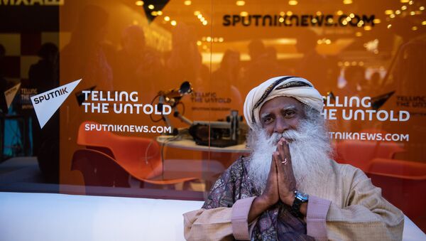 Sadhguru, an Indian yogi, mystic and founder of the Isha Foundation, at the Rossiya Segodnya stand at the 2018 St. Petersburg International Economic Forum - Sputnik International