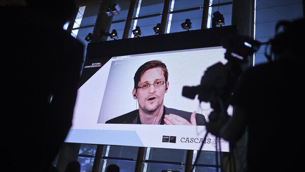 US former CIA employee and whistle-blower Edward Snowden delivers a speech by video conference during the debate at the Estoril Conferences - Global Challenges Local Answers held at Estoril, outskirts of Lisbon, on May 30, 2017 - Sputnik International