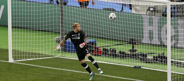 Liverpool goalkeeper Loris Karius looks at the ball after Real Madrid's Gareth Bale scored his side's 3rd goal during the Champions League Final soccer match between Real Madrid and Liverpool at the Olimpiyskiy Stadium in Kiev, Ukraine, Saturday, May 26, 2018 Liverpool goalkeeper Loris Karius looks at the ball after Real Madrid's Gareth Bale scored his side's 3rd goal during the Champions League Final soccer match between Real Madrid and Liverpool at the Olimpiyskiy Stadium in Kiev, Ukraine, Saturday, May 26, 2018 - Sputnik International
