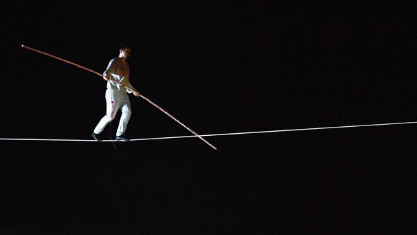 Tightrope walker performing within the frawework of SPIEF celebrations held by St. Petersburg Governor - Sputnik International