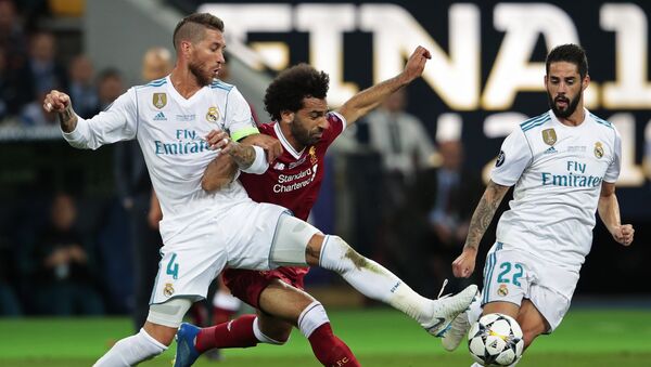 From left: Sergio Ramos from Real Madrid FC (Madrid, Spain), Mohamed Salah from Liverpool FC (Liverpool, England) and Isco from Real Madrid FC during the 2017-2018 UEFA Champions League final match between Liverpool FC and Real Madrid FC - Sputnik International