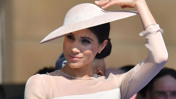 Meghan, Duchess of Sussex attends a garden party at Buckingham Palace, in London, Britain May 22, 2018 - Sputnik International