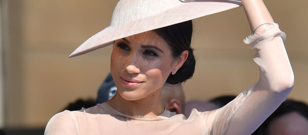 Meghan, Duchess of Sussex attends a garden party at Buckingham Palace, in London, Britain May 22, 2018 Meghan, Duchess of Sussex attends a garden party at Buckingham Palace, in London, Britain May 22, 2018 - Sputnik International