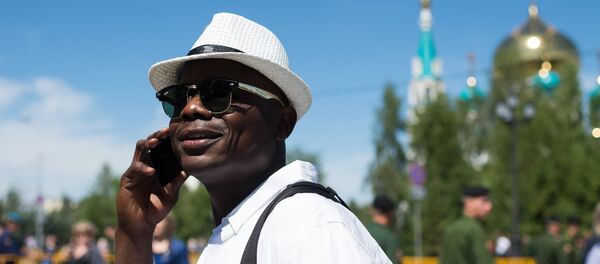 A man during Russia Day celebrations on Sobornaya Square, Omsk A man during Russia Day celebrations on Sobornaya Square, Omsk - Sputnik International
