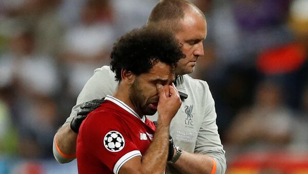 Soccer Football - Champions League Final - Real Madrid v Liverpool - NSC Olympic Stadium, Kiev, Ukraine - May 26, 2018 Liverpool's Mohamed Salah looks dejected as he is substituted off due to injury - Sputnik International