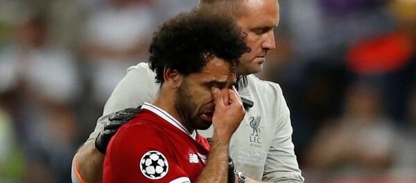 Soccer Football - Champions League Final - Real Madrid v Liverpool - NSC Olympic Stadium, Kiev, Ukraine - May 26, 2018 Liverpool's Mohamed Salah looks dejected as he is substituted off due to injury Soccer Football - Champions League Final - Real Madrid v Liverpool - NSC Olympic Stadium, Kiev, Ukraine - May 26, 2018 Liverpool's Mohamed Salah looks dejected as he is substituted off due to injury - Sputnik International