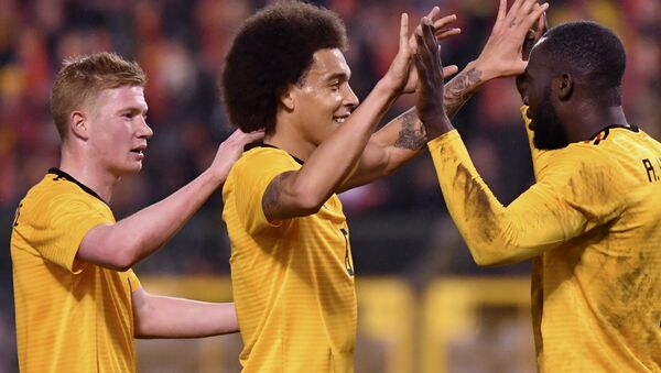 Belgium's Romelu Lukaku (right) is congratulated by team-mates Kevin de Bruyne (left) and Axel Witsel after scoring during a friendly in March 2018 - Sputnik International