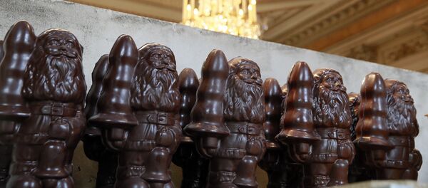 Items made with chocolate are pictured during the presentation of the exhibition Chocolate Factory by US artist Paul McCarthy at the Hotel de la Monnaie in Paris on October 24, 2014 in Paris - Sputnik International