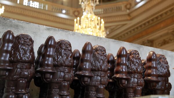 Items made with chocolate are pictured during the presentation of the exhibition Chocolate Factory by US artist Paul McCarthy at the Hotel de la Monnaie in Paris on October 24, 2014 in Paris - Sputnik International