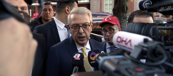 (File) Turkish Ambassador Serdar Kilic, center, speaks to reporters and supporters near the White House in Washington, Monday, May 15, 2017 - Sputnik International