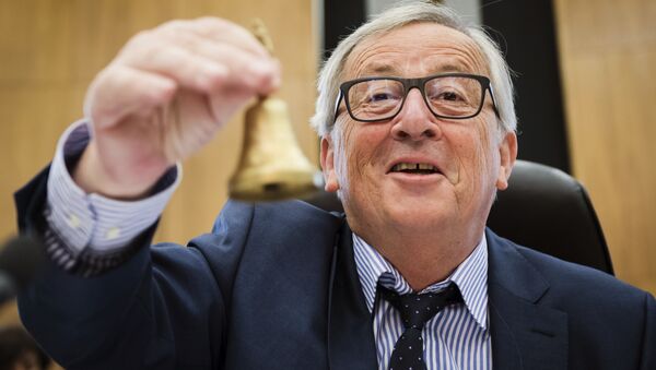 EU Commission President Jean-Claude Juncker rings the bell as he opens the college of commissioners at EU headquarters in Brussels, Wednesday, May 23, 2018 - Sputnik International