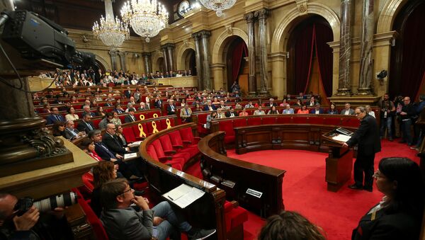 Candidate for the regional presidency of Catalonia, Quim Torra, delivers a speech at the start of an investiture debate at the regional parliament in Barcelona, Spain, May 14, 2018 - Sputnik International
