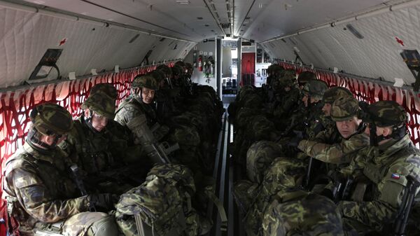 Czech Republic's soldiers from the 43rd airborne battalion sit inside an aircraft during the NATO drill The Noble Jump at the airport in Pardubice, Czech Republic (File) - Sputnik International