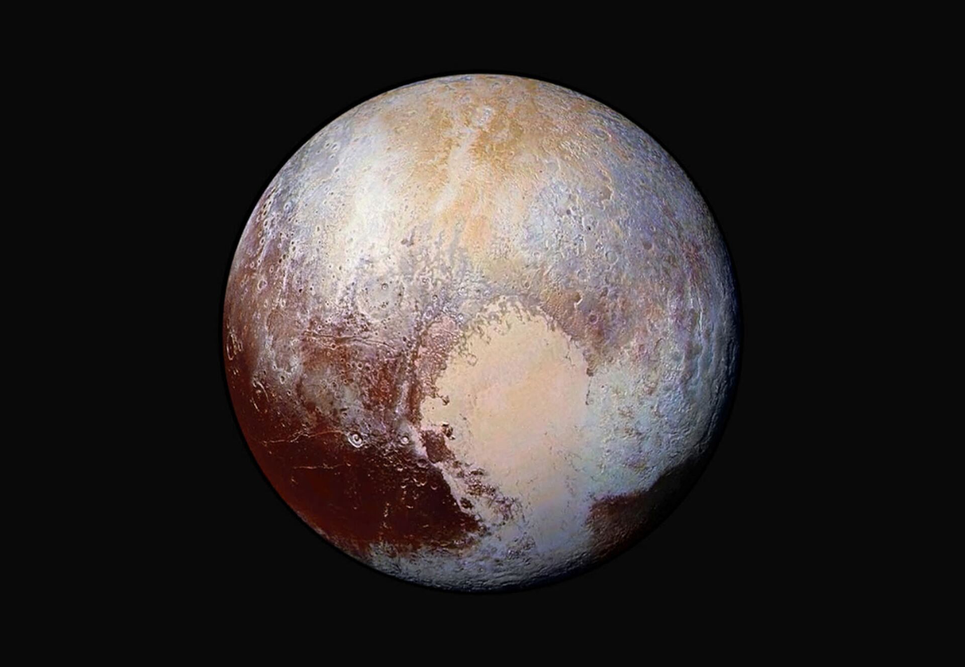 The planet Pluto is pictured in a handout image made up of four images from New Horizons' Long Range Reconnaissance Imager (LORRI) taken in July 2015 combined with color data from the Ralph instrument to create this enhanced color global view - Sputnik International, 1920, 29.03.2022