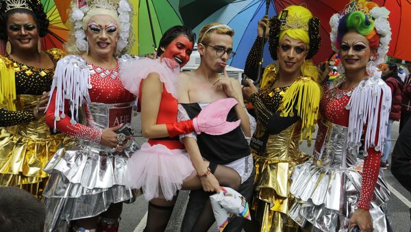 Revelers in costume attend the annual gay pride parade in Sao Paulo, Brazil, Sunday, June 3, 2018 - Sputnik International