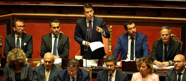 Newly appointed Italian Prime Minister Giuseppe Conte speaks next to Interior Minister Matteo Salvini, Minister of Labor and Industry Luigi Di Maio, Minister of Justice Alfonso Bonafede and Foreign Minister Enzo Moavero Milanesi during his first session at the Senate in Rome, Italy, June 5, 2018 - Sputnik International