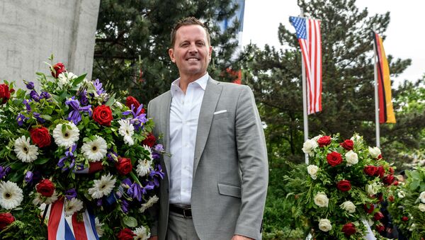 U.S. ambassador to Germany Richard Allen Grenell stands beside a wreath in Berlin, Germany, May 12, 2018 - Sputnik International