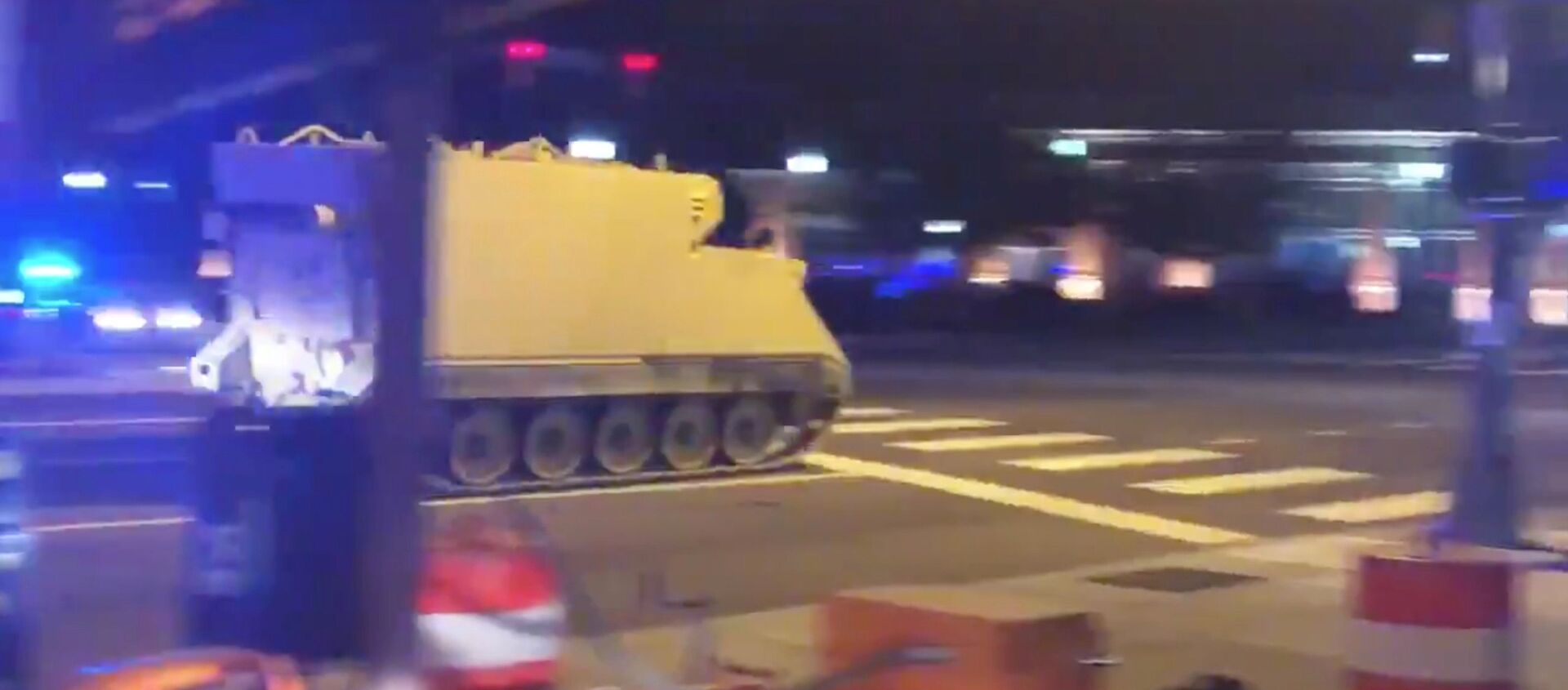 An armoured personnel carrier (APC), which was purpotedly stolen, drives along a street in Richmond, Virginia, U.S. June 5, 2018, in this still image taken from a video obtained from social media - Sputnik International, 1920, 06.06.2018