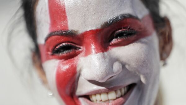 An English soccer fan smiles as she enters the Velodrome stadium ahead of the Euro 2016 Group B soccer match between England and Russia, in Marseille, France, Saturday, June 11, 2016. - Sputnik International