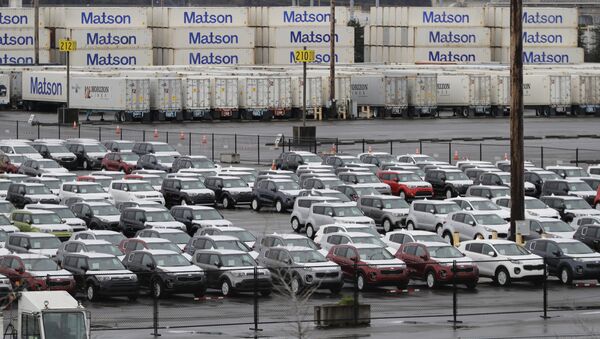 New cars and cargo containers are shown in a staging area, Friday, April 6, 2018, at the Port of Tacoma in Tacoma, Wash. - Sputnik International