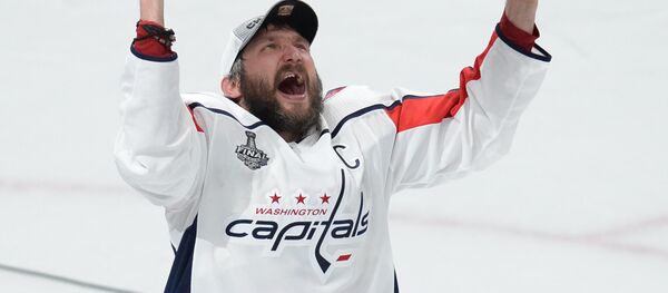 Jun 7, 2018; Las Vegas, NV, USA; Washington Capitals left wing Alex Ovechkin (8) hoists the Stanley Cup after defeating the Vegas Golden Knights in game five of the 2018 Stanley Cup Final at T-Mobile Arena - Sputnik International