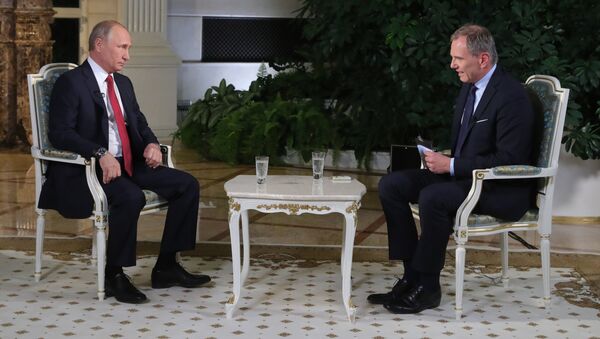Russian President Vladimir Putin during an interview with Armin Wolf, right, a journalist of the Austrian ORF TV and radio company, at the Kremlin - Sputnik International