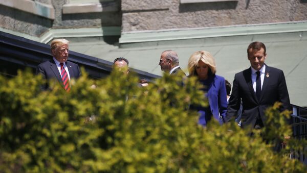 U.S. President Donald Trump looks over at France's President Macron as he arrives at the G7 Summit in Charlevoix, Canada - Sputnik International