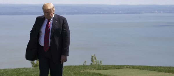 US President Donald Trump steps away after the family photo at the G7 Summit in La Malbaie, Canada, June 8, 2018. US President Donald Trump steps away after the family photo at the G7 Summit in La Malbaie, Canada, June 8, 2018. - Sputnik International