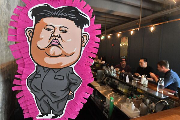 Pinata with image resembling North Korean leader Kim Jong-un in June, 2018 - Sputnik International
