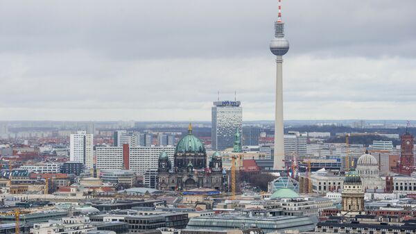 View of the Berlin skyline seen from Potsdamer Platz to Alexanderplatz, including the TV Tower, the Berlin Cathedral (R), the Berlin palace under construction and the city's town hall (Rotes Rathaus, R) - Sputnik International