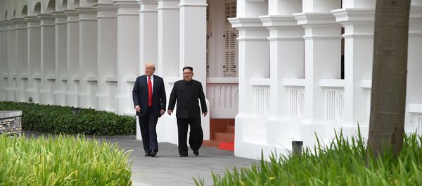 U.S. President Donald Trump and North Korean leader Kim Jong Un walk in the Capella Hotel after their working lunch, on Sentosa island in Singapore June 12, 2018 U.S. President Donald Trump and North Korean leader Kim Jong Un walk in the Capella Hotel after their working lunch, on Sentosa island in Singapore June 12, 2018 - Sputnik International