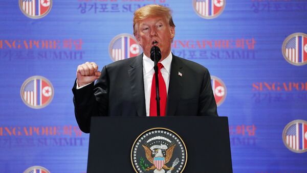 U.S. President Donald Trump speaks during a news conference after his meeting with North Korean leader Kim Jong Un at the Capella Hotel on Sentosa island in Singapore June 12, 2018 - Sputnik International
