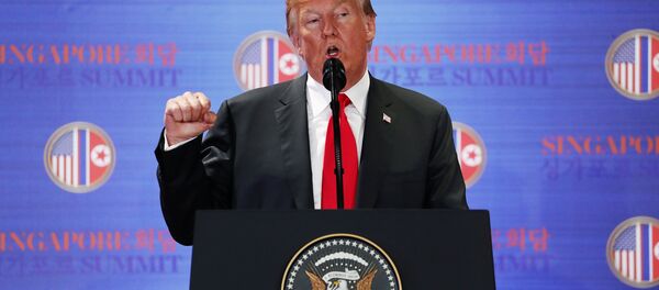 U.S. President Donald Trump speaks during a news conference after his meeting with North Korean leader Kim Jong Un at the Capella Hotel on Sentosa island in Singapore June 12, 2018 - Sputnik International