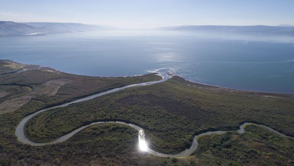 An aerial view shows the Jordan River estuary of the Sea of Galilee near the community settlement of Karkom, northern Israel (File) - Sputnik International