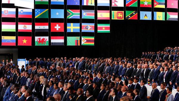 Participants of the 68th FIFA Congress observe a minute of silence in memory of delegates, who recently passed away, in Moscow, Russia June 13, 2018. - Sputnik International