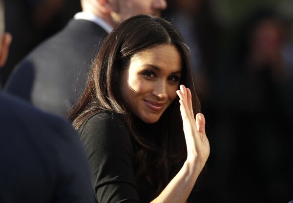 Meghan Markle waves as she leaves with Prince Harry after watching a hip hop opera performance by young people involved in the Full Effect programme at the Nottingham Academy school in Nottingham, England, Friday Dec. 1, 2017 Meghan Markle waves as she leaves with Prince Harry after watching a hip hop opera performance by young people involved in the Full Effect programme at the Nottingham Academy school in Nottingham, England, Friday Dec. 1, 2017 - Sputnik International