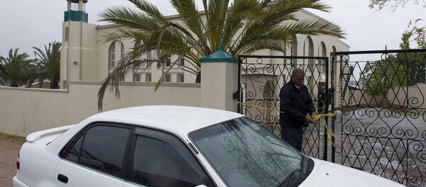 An investigator attends to the gates of a mosque in Malmesbury, near Cape Town, South Africa Thursday June 14 2018 An investigator attends to the gates of a mosque in Malmesbury, near Cape Town, South Africa Thursday June 14 2018 - Sputnik International