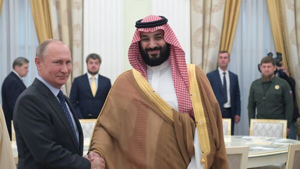 Russian President Vladimir Putin and Saudi Crown Prince, Second Deputy Prime Minister and Defense Minister Mohammad bin Salman Al Saud, right, during a meeting. - Sputnik International