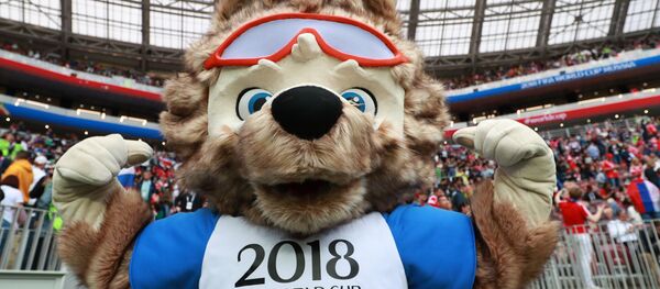 The official mascot of the FIFA World Cup 2018 wolf Zabivaka during the break of the match of the group stage of the World Cup between Russian and Saudi Arabian national teams The official mascot of the FIFA World Cup 2018 wolf Zabivaka during the break of the match of the group stage of the World Cup between Russian and Saudi Arabian national teams - Sputnik International