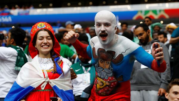 Soccer Football - World Cup - Group A - Russia vs Saudi Arabia - Luzhniki Stadium, Moscow, Russia - June 14, 2018 Russia fan with body paint before the match - Sputnik International